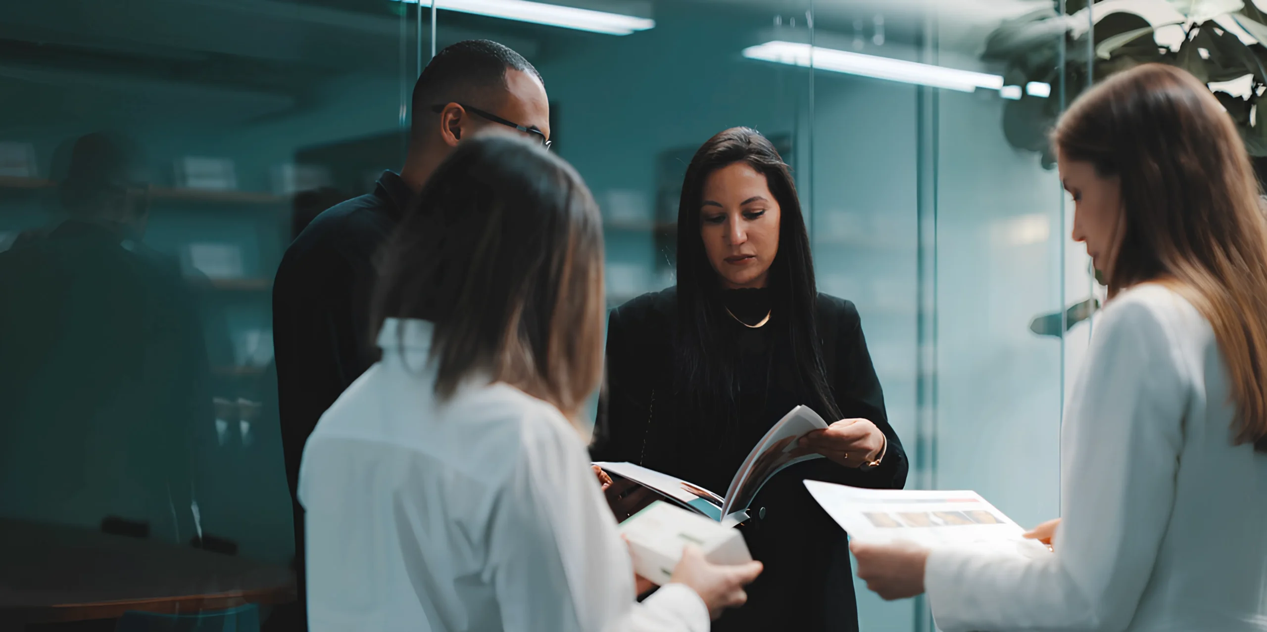 Louna Aesthetics team discussing regenerative treatments