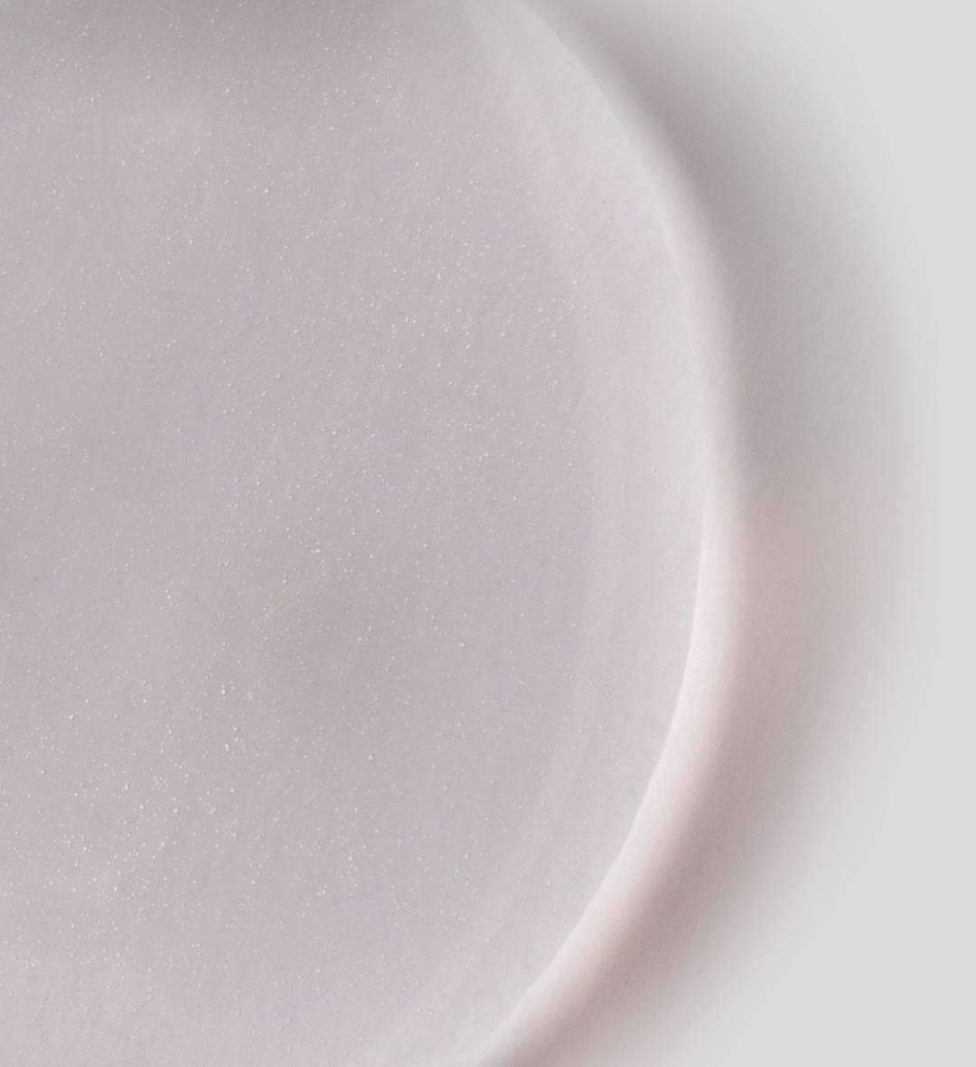 Close-up of a translucent skincare formulation texture representing Exovyal's active base
